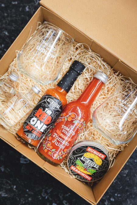 Beefy Boys Sauces (The Red One and Tomato sauce) in presentation box, with Spirit of Ludlow Gin mini-bottles, 2 glasses, Beefy Boys burger seasoning.