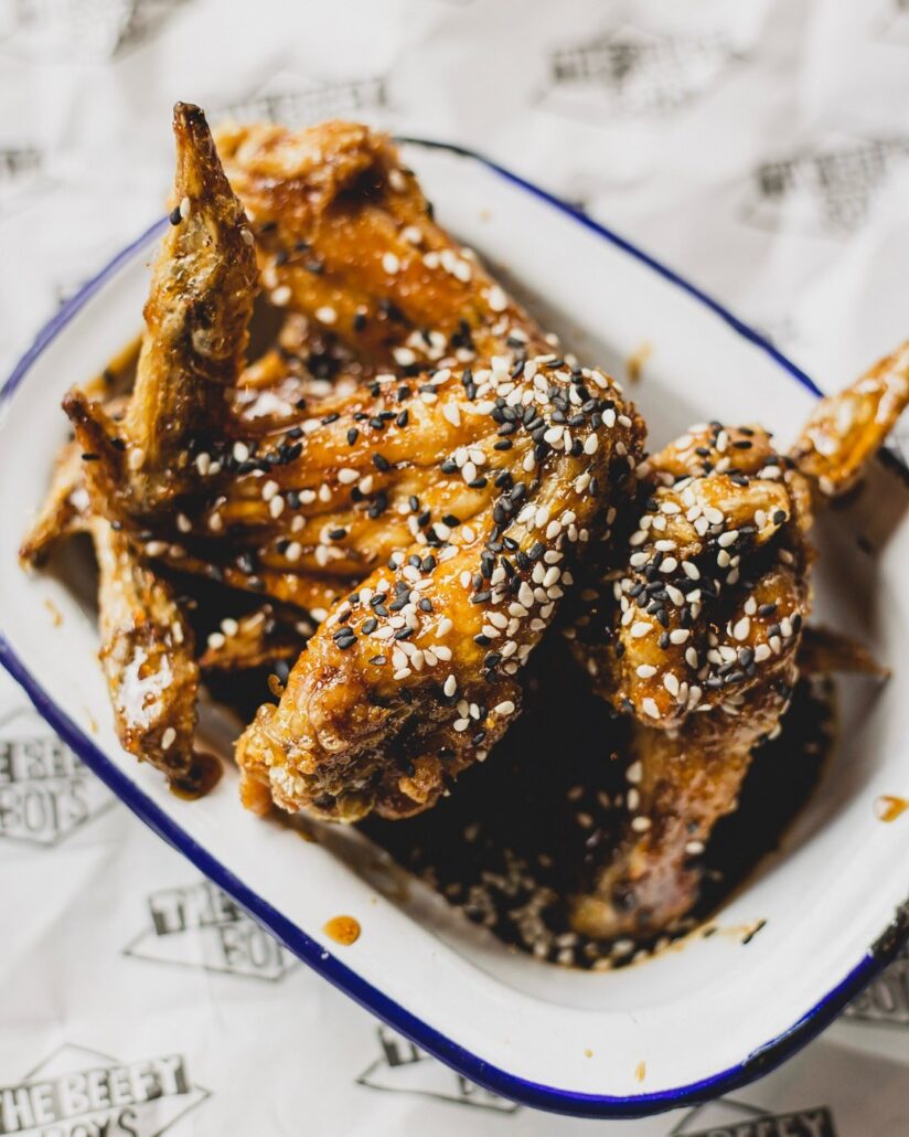 Our Ninja Wings are marinated in a delectable mix of soy, garlic, and honey, finished with a sprinkling of sesame seeds