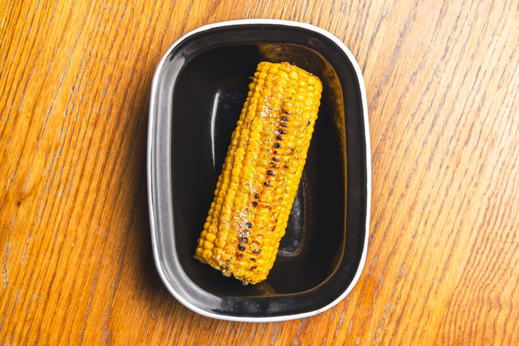 Simple Salt and Pepper Corn on the cob in a black bowl