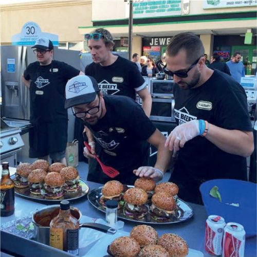 The boys at a burger competition - one last check before the judges dive in!
