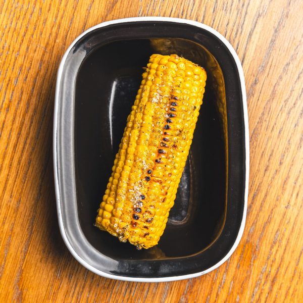 Simple Salt and Pepper Corn on the cob in a black bowl